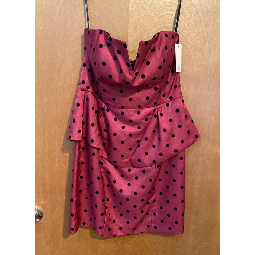 Strapless polka dot peplum dress